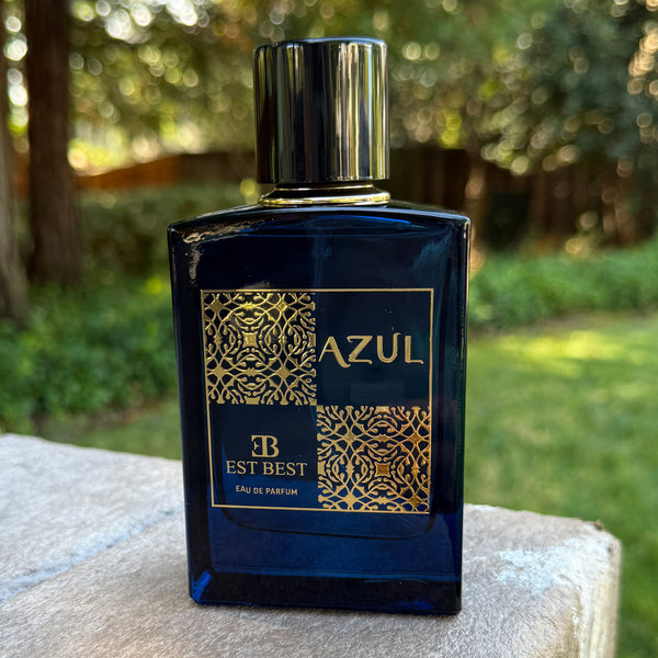 AZUL Eau De Parfum bottle by EST BEST photographed outdoors — elegant blue glass men’s cologne.