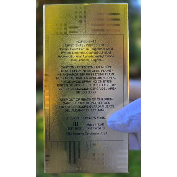 Back of DE BILLION perfume packaging showing ingredients, caution text, and manufacturing details.